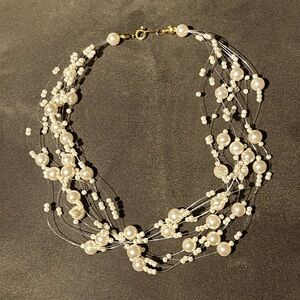 Yves Rocher nine strand necklace.